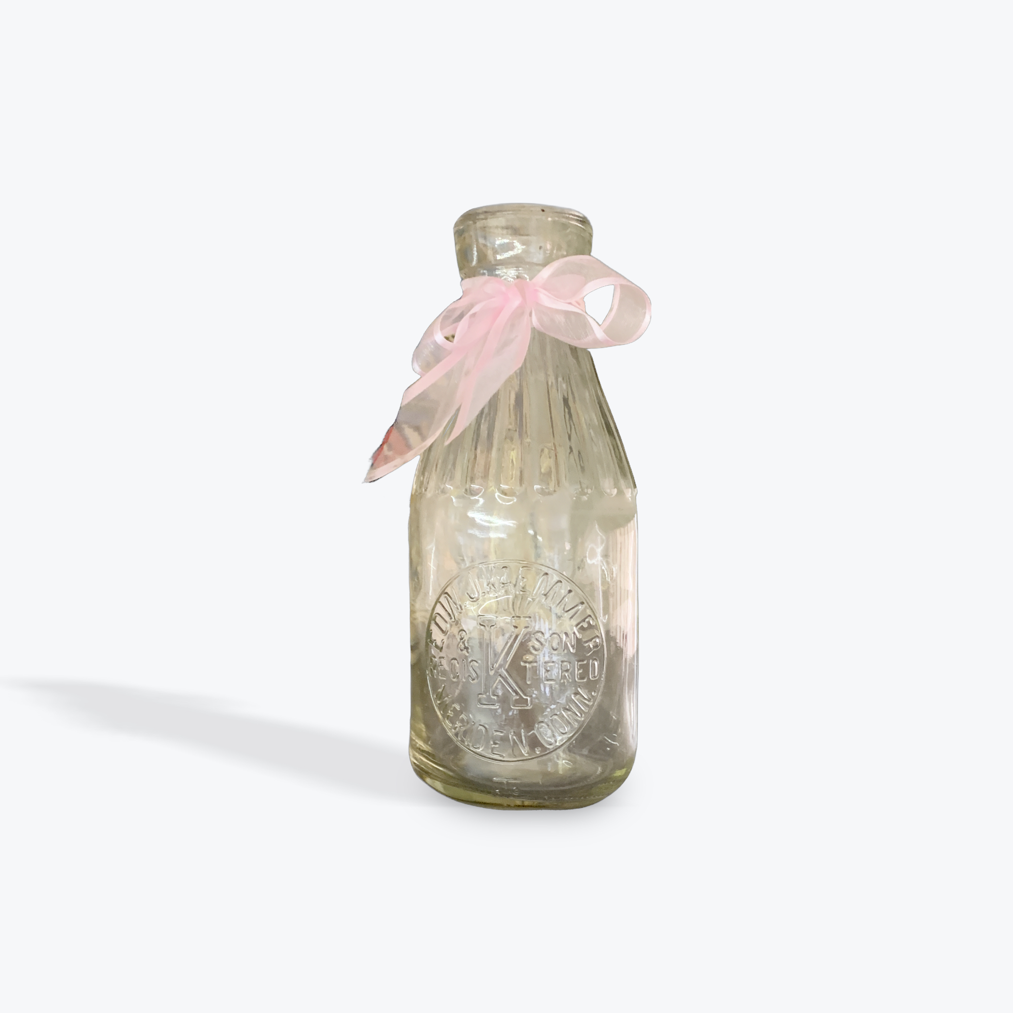 milk bottle pink ribbon